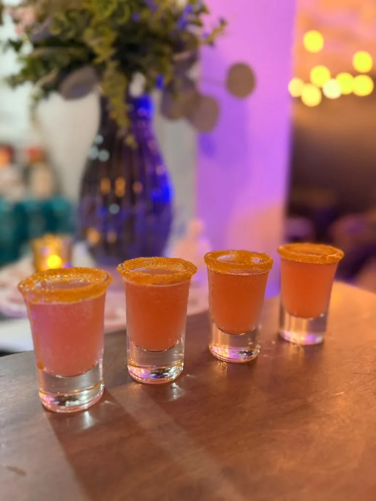 Four orange botanical shots at the Zeus Greek bar